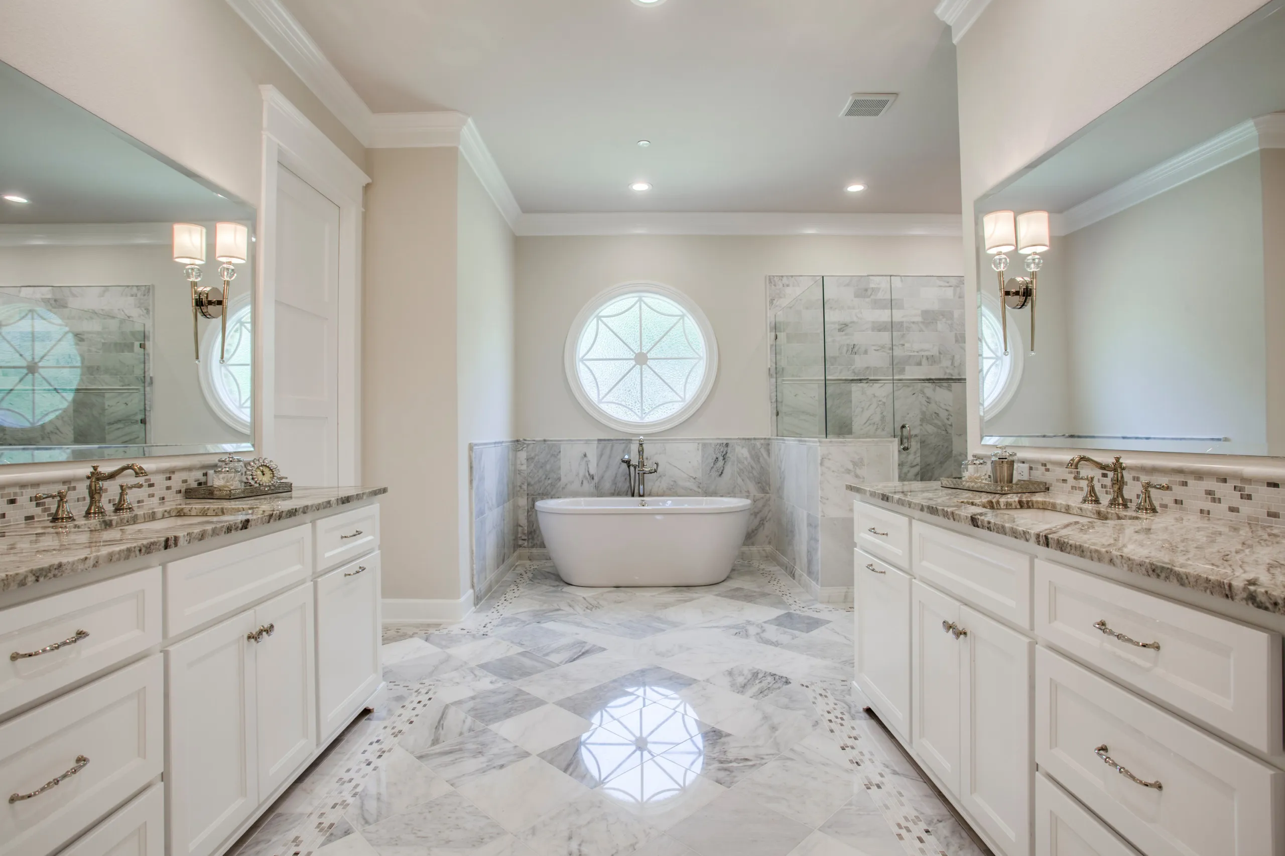 A Southlake primary-suite addition with a stone fireplace and vaulted ceiling.